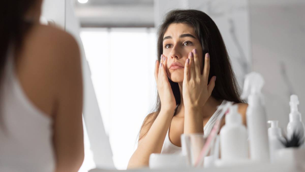 concept image woman wondering if she needs surgery for dark circles